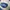 Topi Bud Light Racing Open Bottles Trucker Hat photo 4