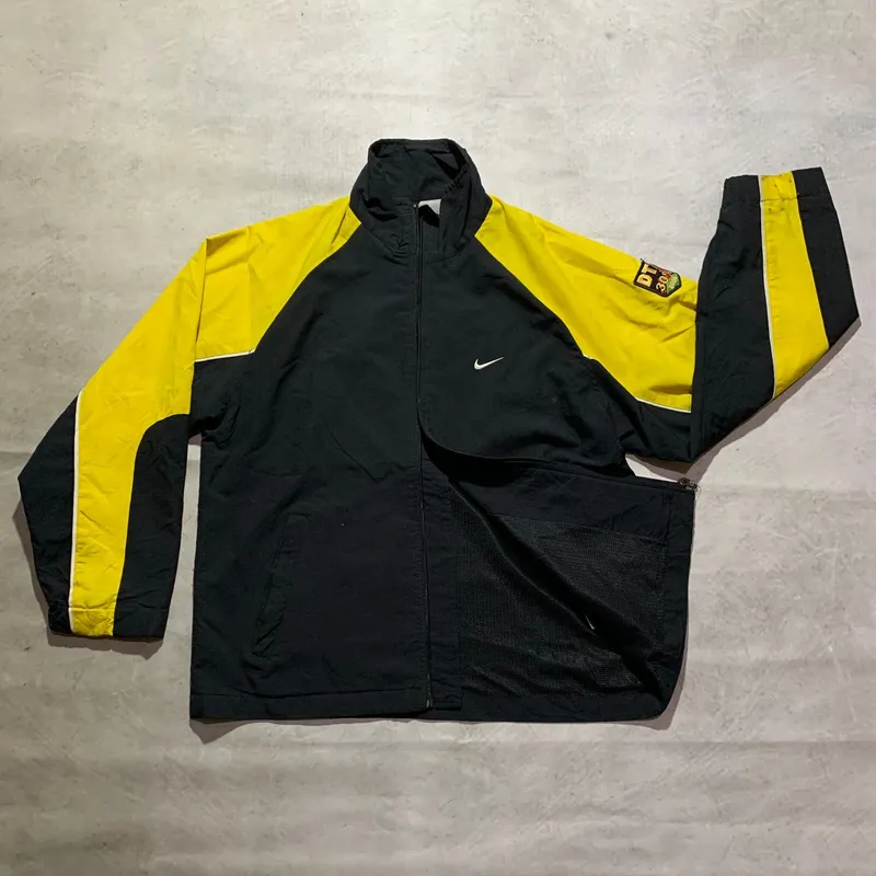 yellow and black nike windbreaker