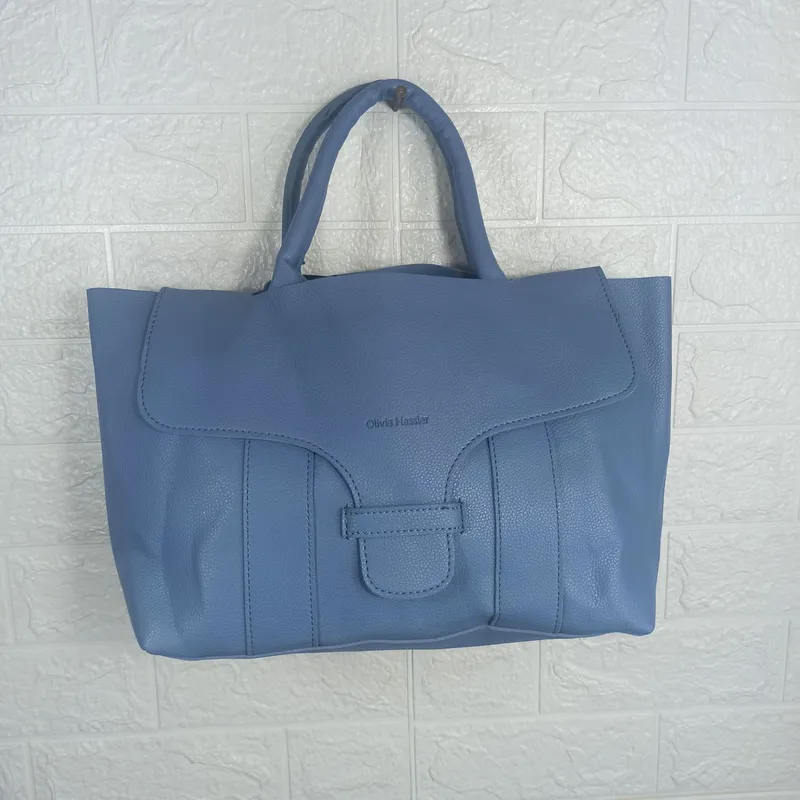 Olivia hassler bag price 2025