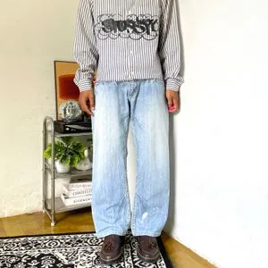 BuckleBack denim lighting blue baggy jeans