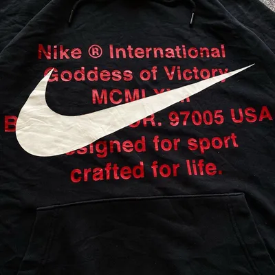 black nike hoodie with red writing