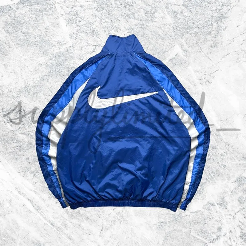 JAKET WINDBREAKER NIKE BIG LOGO photo 1