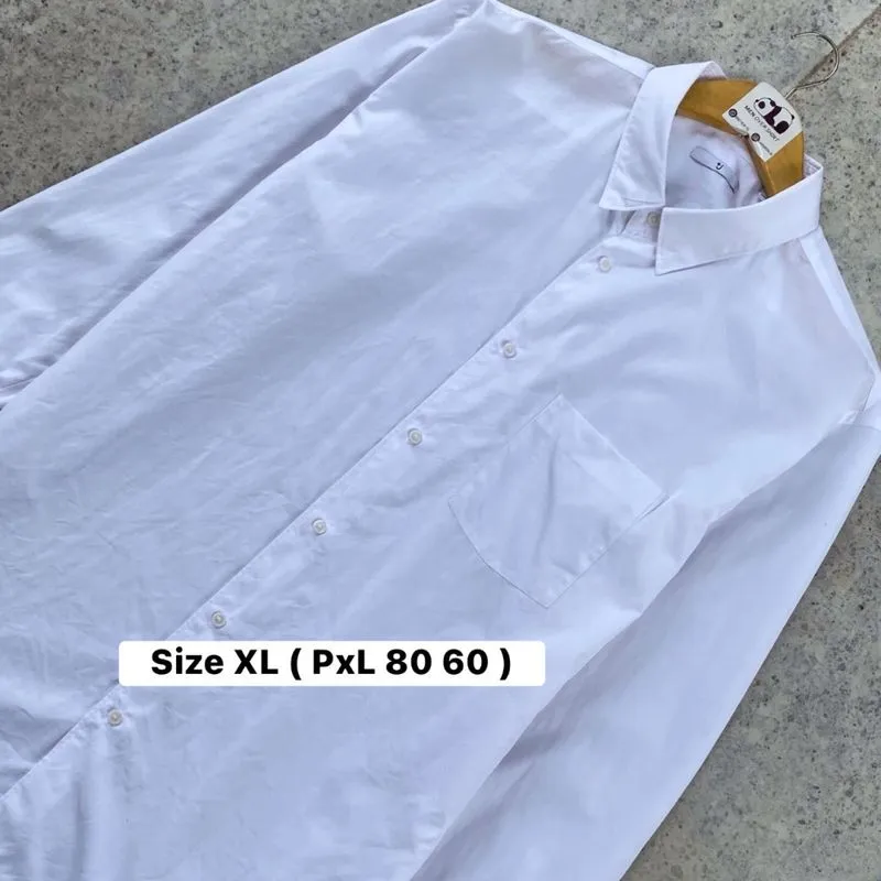 Kemeja Putih Uniqlo x Jil Sander photo 1