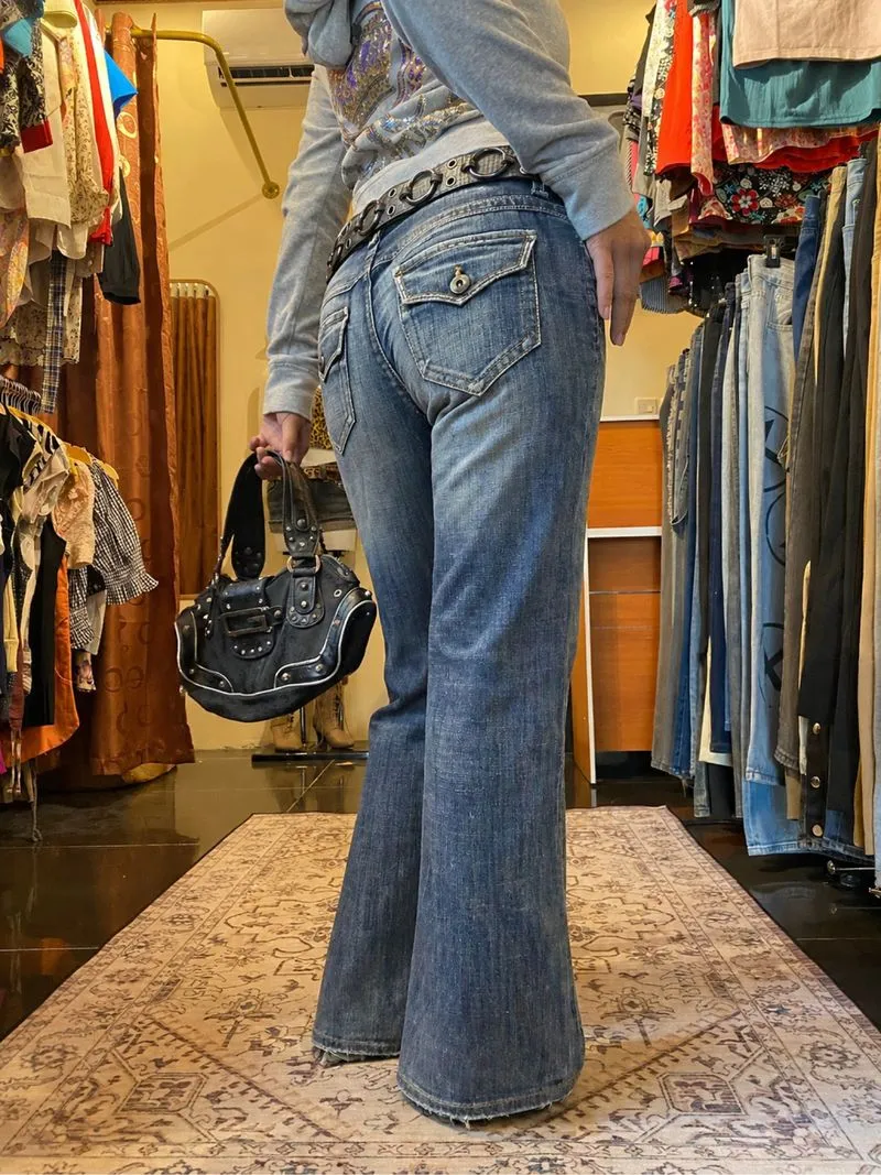 Ong jeans distressed claw lowrise flare jeans photo 1