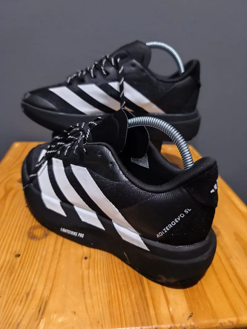 Sepatu Olahraga Pria ADIDAS Adizero Hitam Garis Putih Sporty photo 1