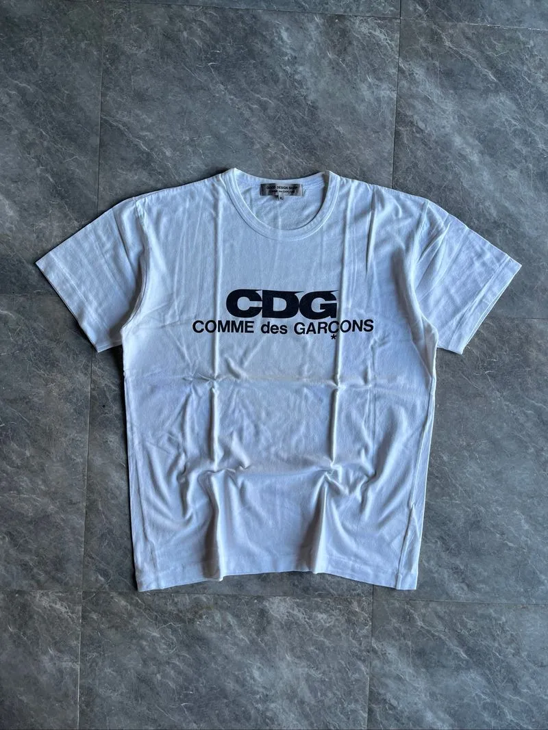 Kaos good design shop x CDG logo photo 1