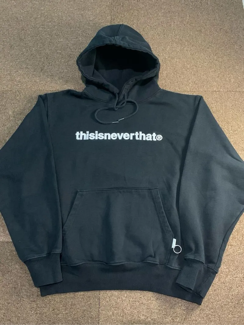 Thisisneverthat logo photo 1