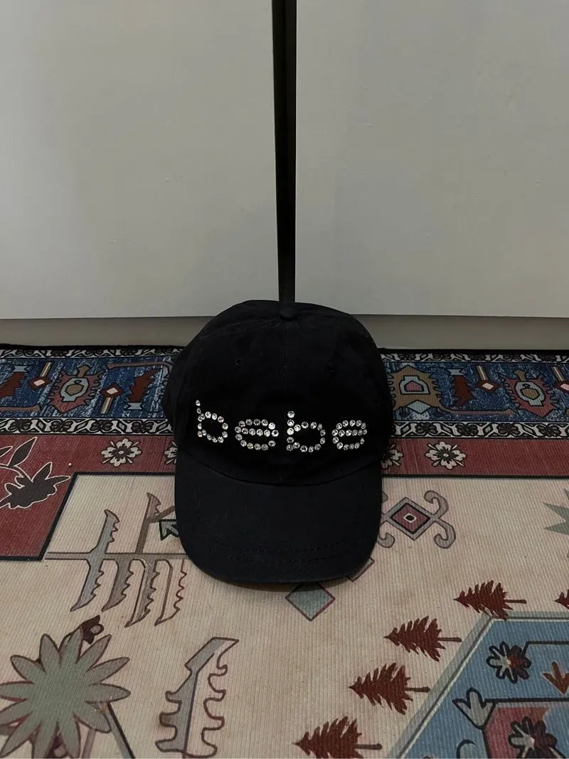 Bebe hat photo 1