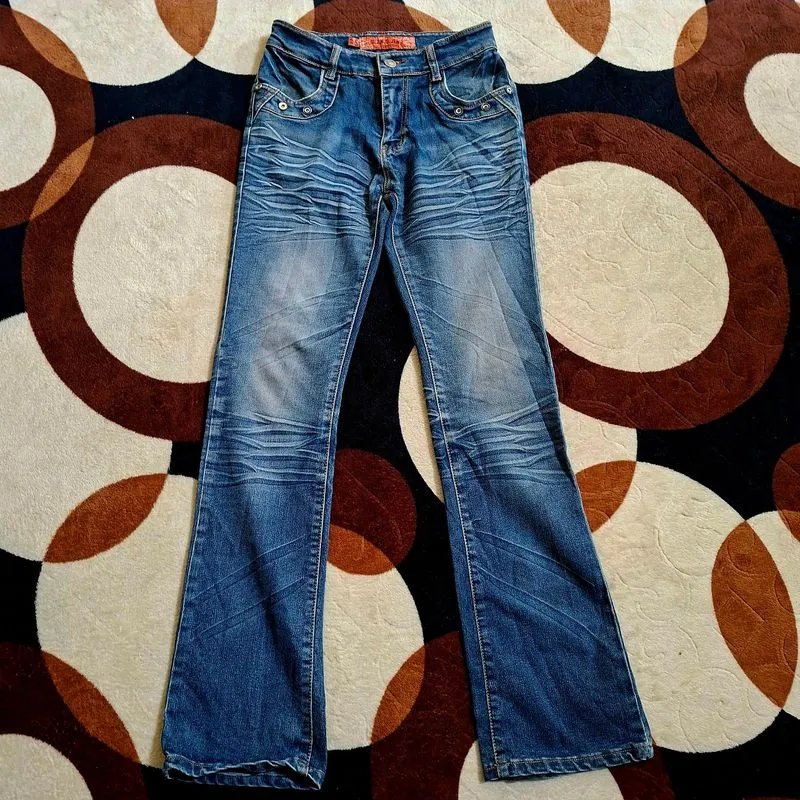 Blue bootcut blue washed jeans with cool details photo 1