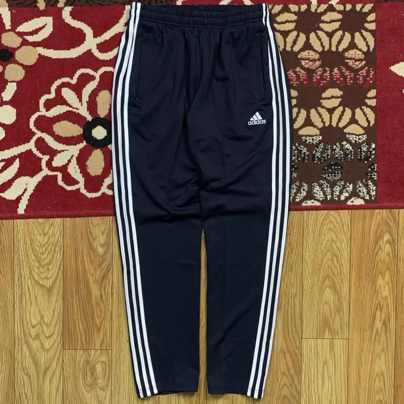 item(s): ADIDAS MARTIAL ARTS ESSENTIALS TRACKPANTS photo 1