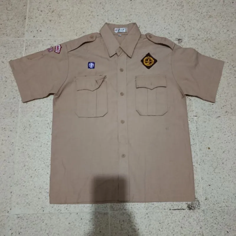 preloved baju pramuka merk tyas bahan famatex/zah3 photo 1