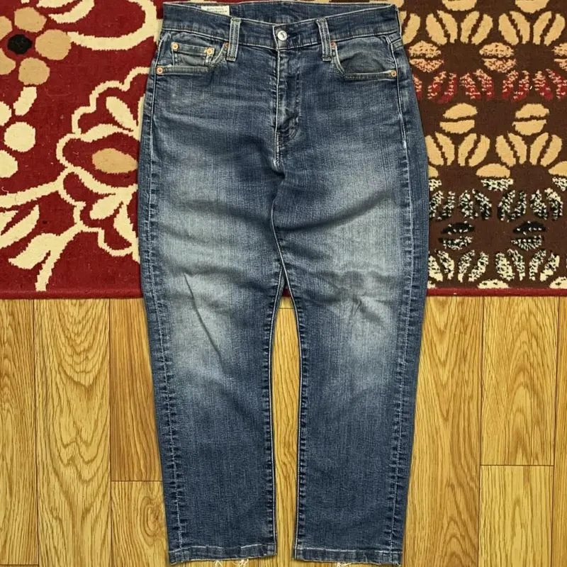 Item(s): VINTAGE L*V1S BIG E LOT 513 DISTRASSED DENIM PANTS photo 1