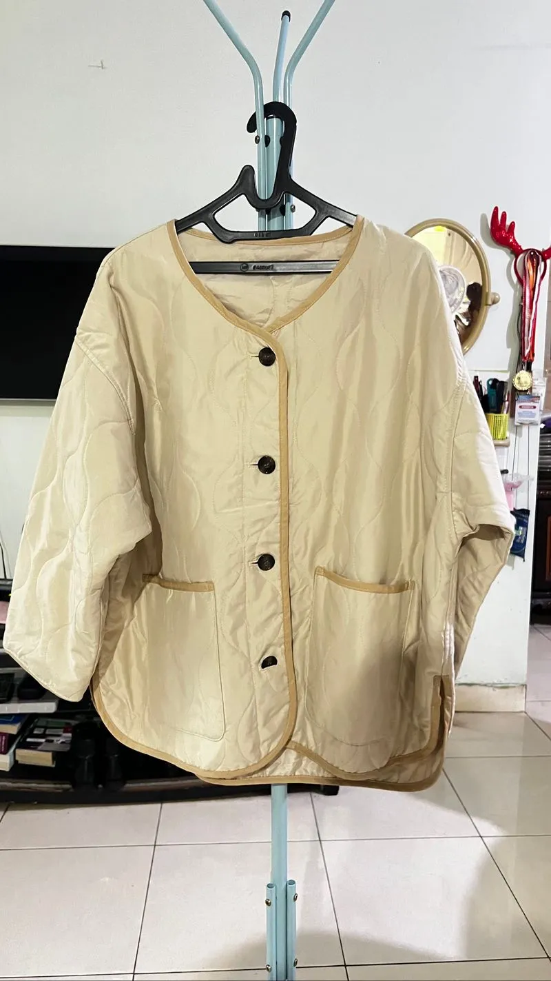 Preloved quilted jacket photo 1