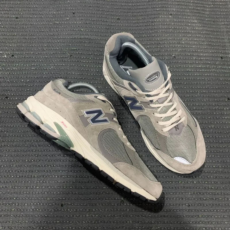 New Balance Streetwear Sneakers Pria gray photo 1
