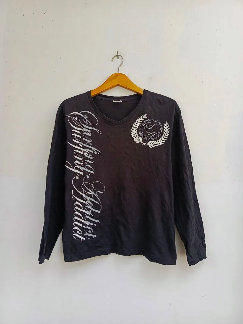 Long sleeve surfing addict photo 1