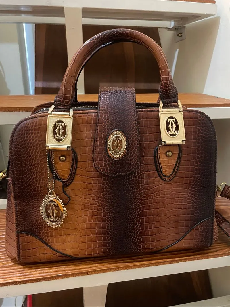 Tas Cartier photo 1