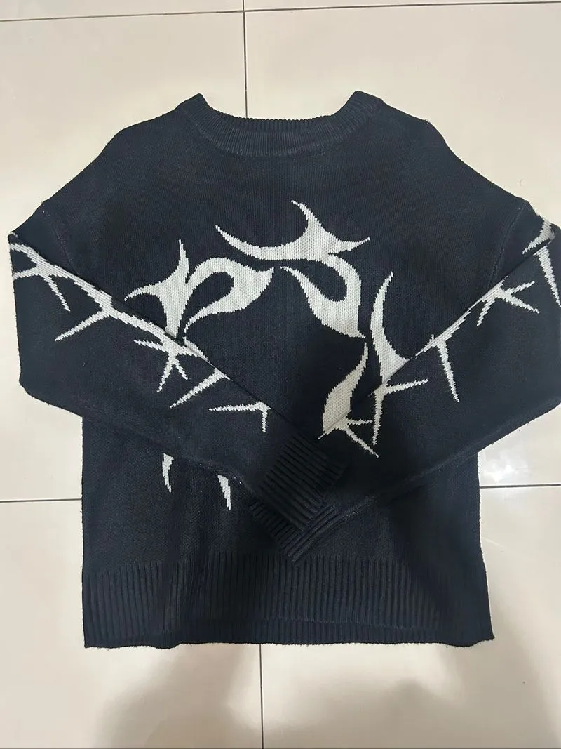 Bershka’s black and white graphic crew neck knit sweater photo 1