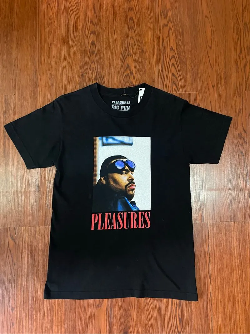 PLEASURES X BIGPUN TEE photo 1