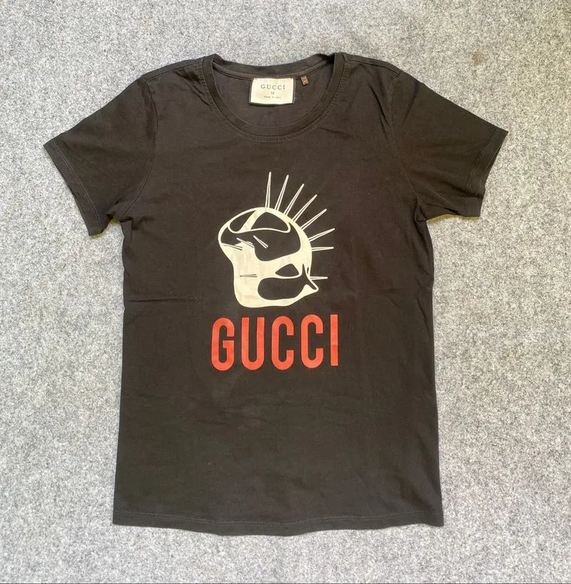 Kaos Tshirt GUCCI Manifesto Logo Mask Collection photo 1