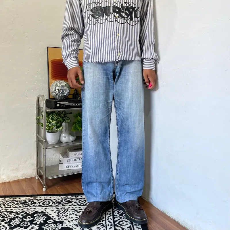 2000’s Levi’s 504 sun fade blue loose jeans photo 1
