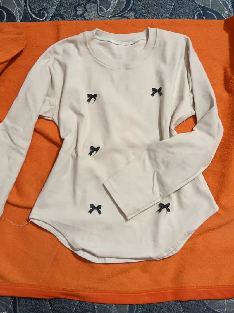 bow long sleeve photo 1