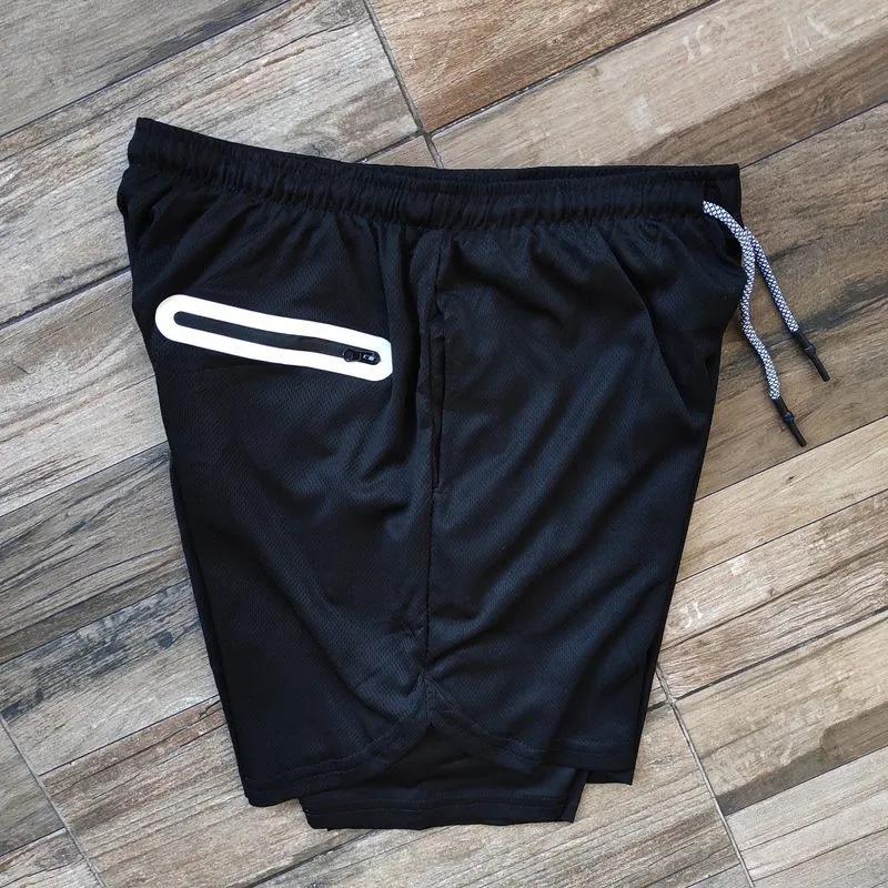 Celana pendek running / lari 2in1 size L photo 1