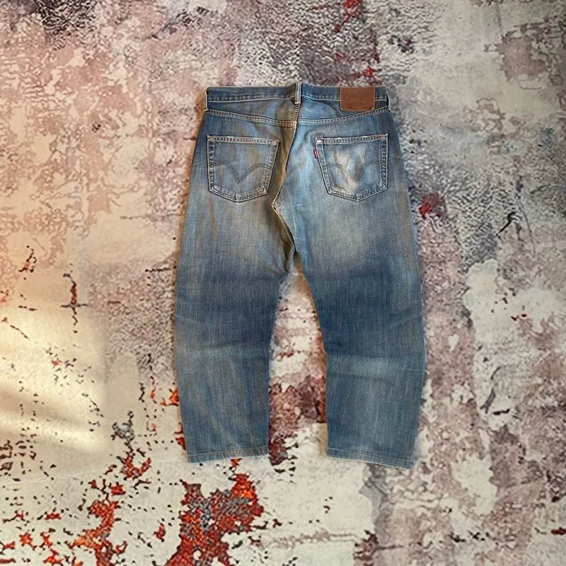 Lev’is 502 Distressed  photo 1
