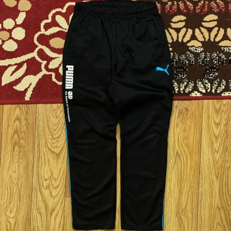 Item(s): PUMA TRACKPANTS photo 1