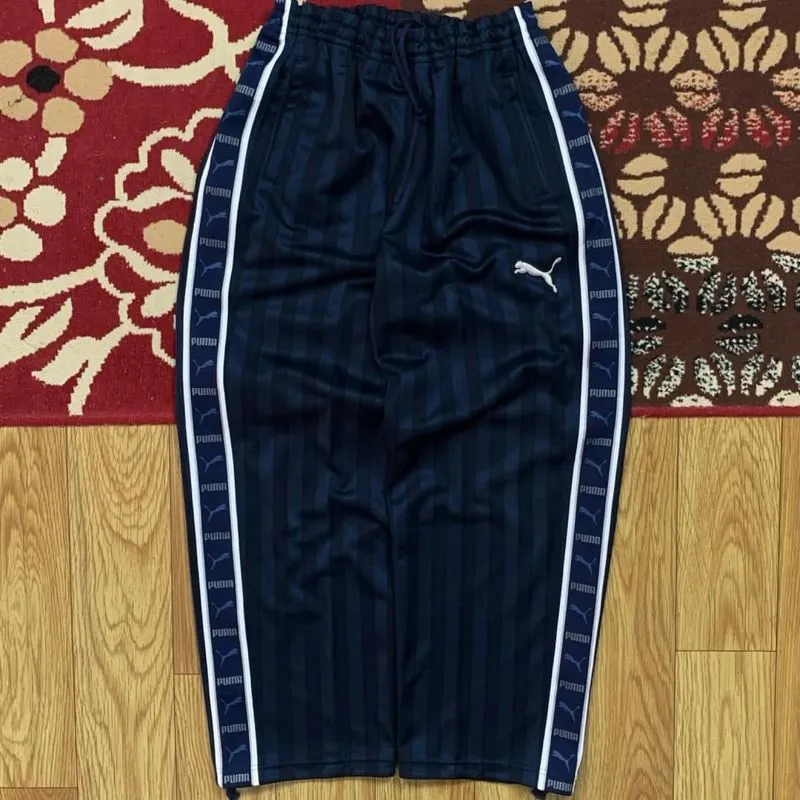 Item(s): JAPAN PUMA TAPPED TRACKPANTS photo 1