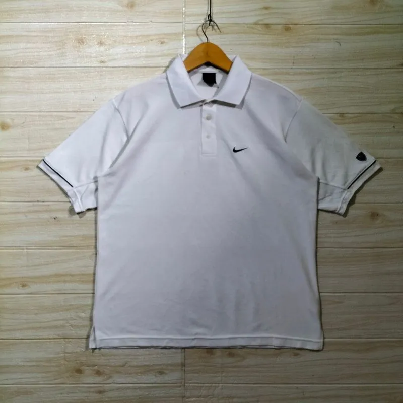 1284. Polo shirt kaos NIKE photo 1