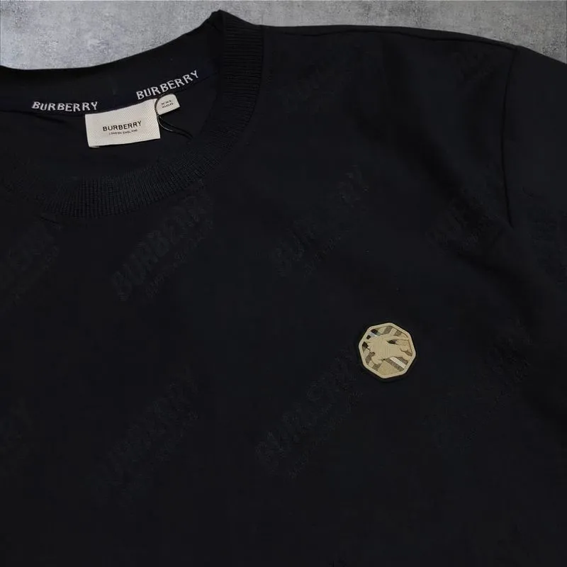 kaos luxury by burberry like new  warna biru photo 1