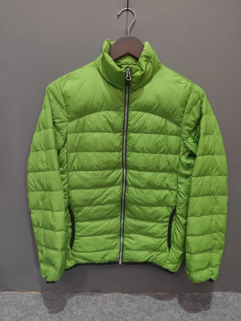 Jaket Outdoor Unisex TOPVALU Hijau Anti Angin Original photo 1