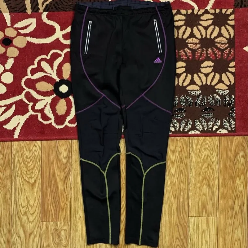 Item(s):ADIDAS ESSENTIALS OUTDOOR REFLECTIVE TRACKPANTS photo 1
