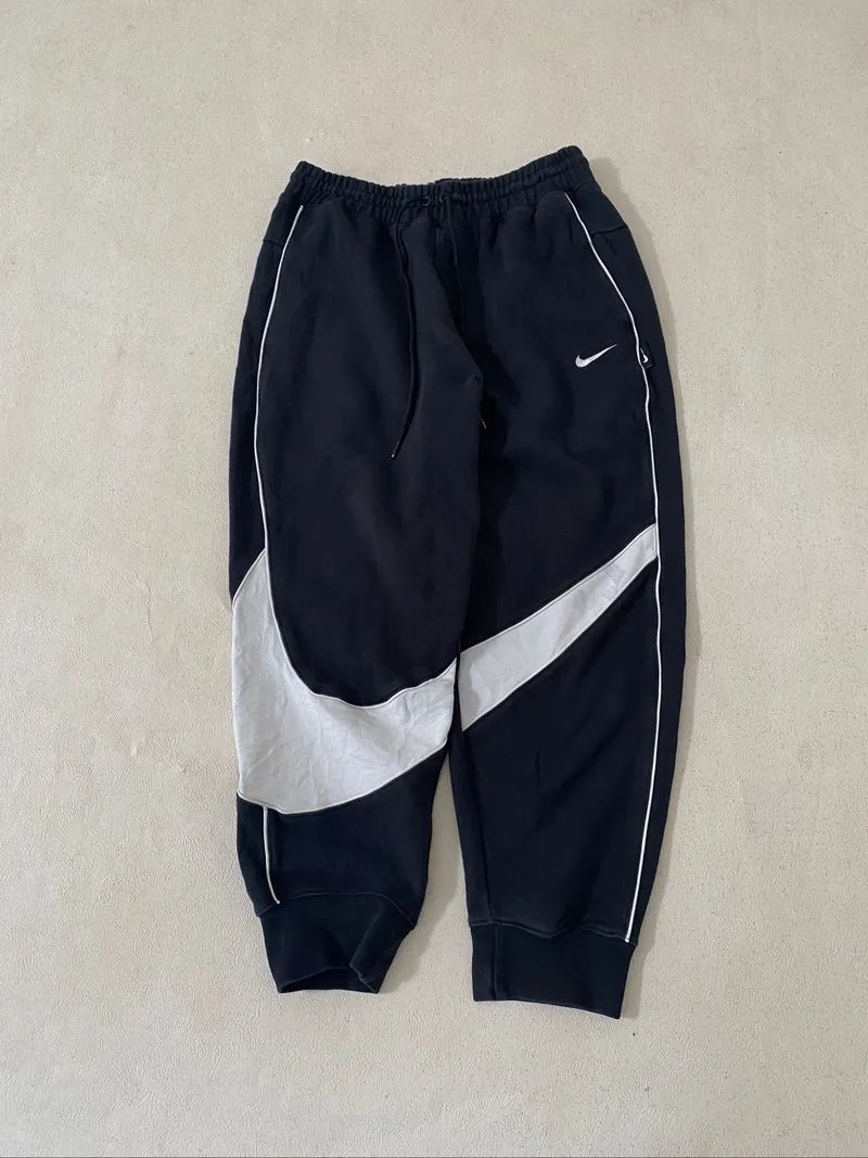 Nike big swoosh baggy sweat pants black photo 1