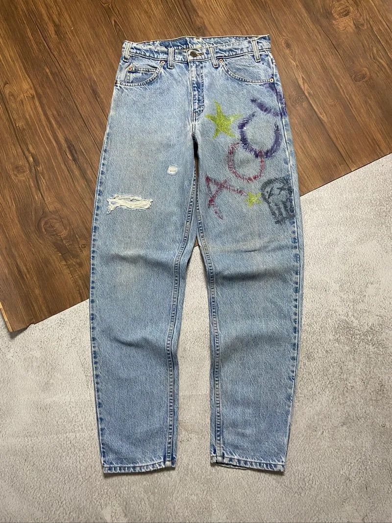 VTG LEVIS 550 ORANGE TAB RIPPED JEANS photo 1