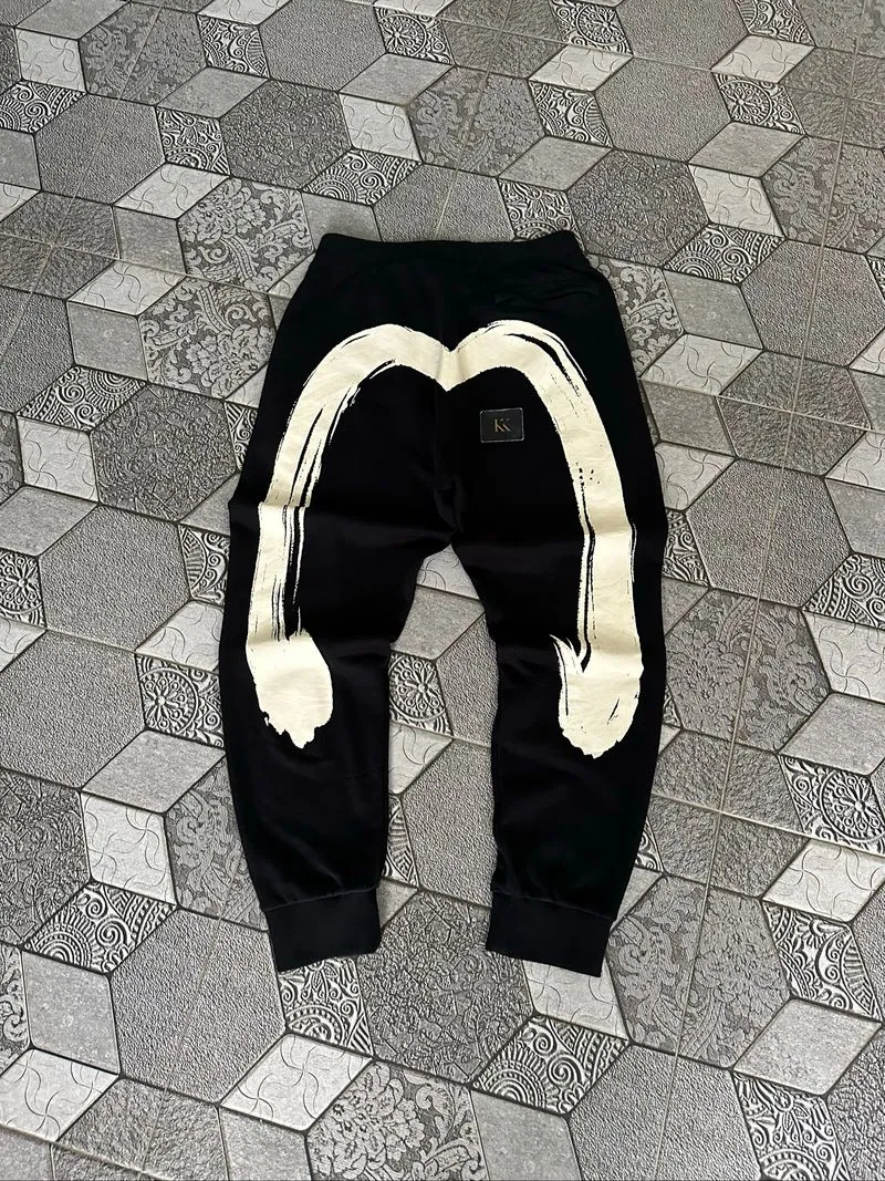 EVISU BRUSHSTROKE DAICOCK SWEATPANTS photo 1