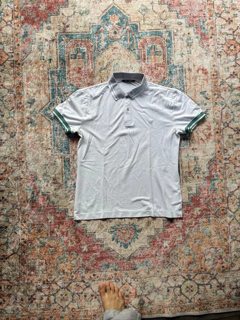 Has White Polo Size M photo 1