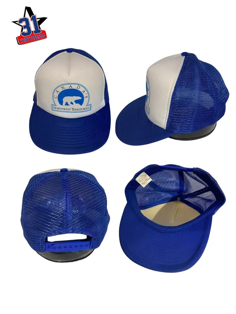 Topi trucker canada’s photo 1