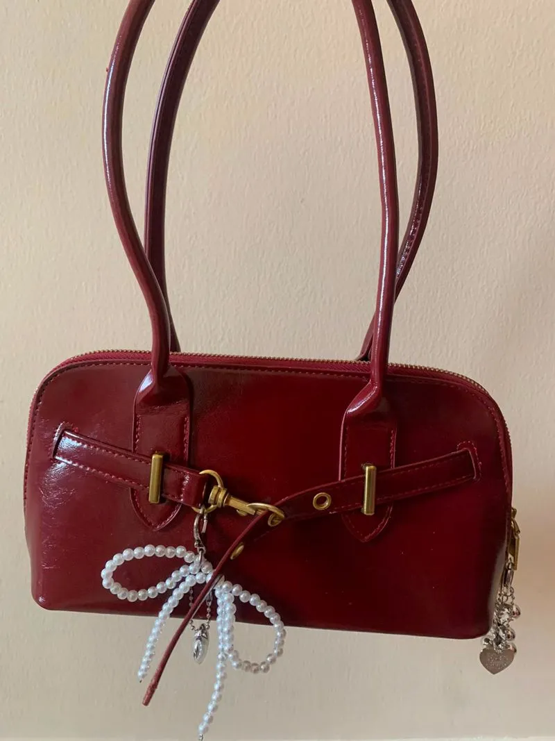 Maroon red shoulder bag with bag charm  photo 1