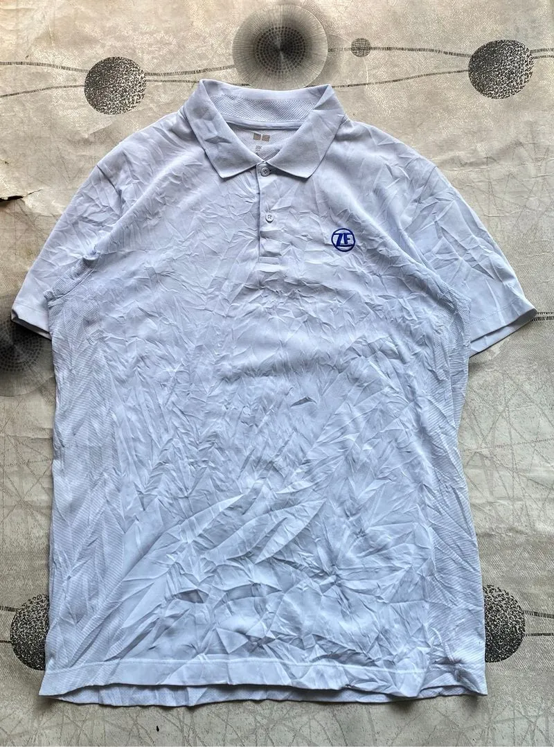 Polo uniqlo dry ex photo 1
