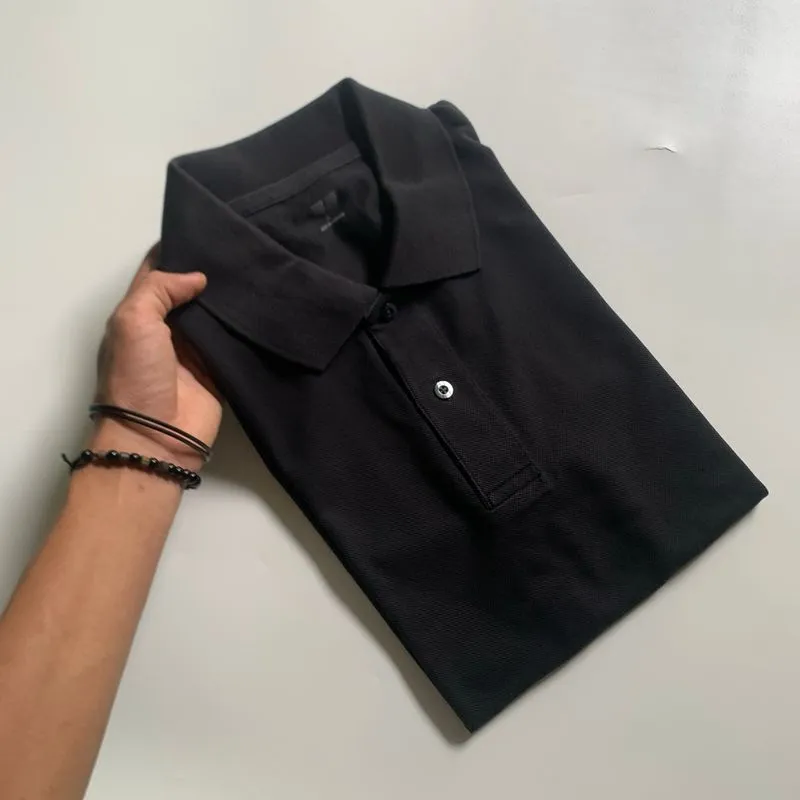 Polo shirts Uniqlo Black photo 1