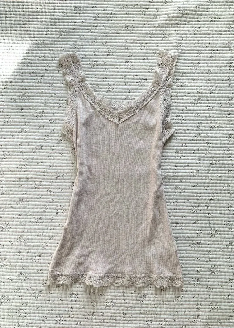 uniqlo cream top photo 1