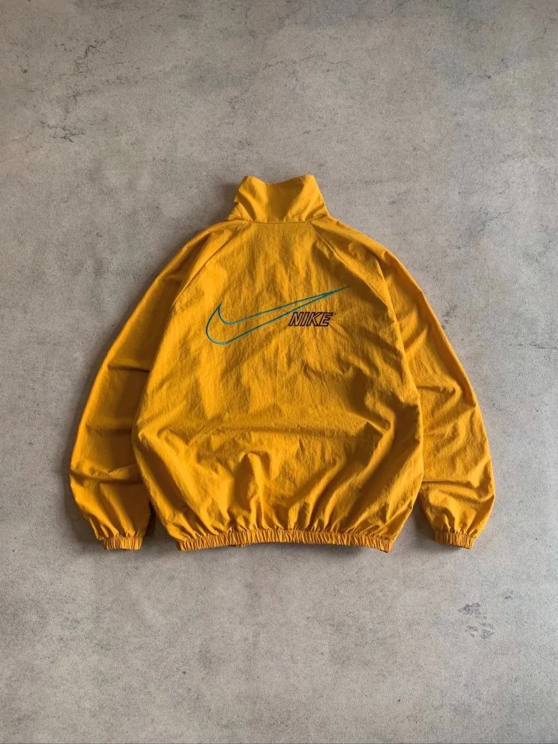 Yellow nike fashion big logo windbreaker jacket ( No tag ) photo 1
