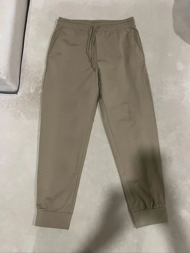Celana Poliester Uniqlo Coklat photo 1