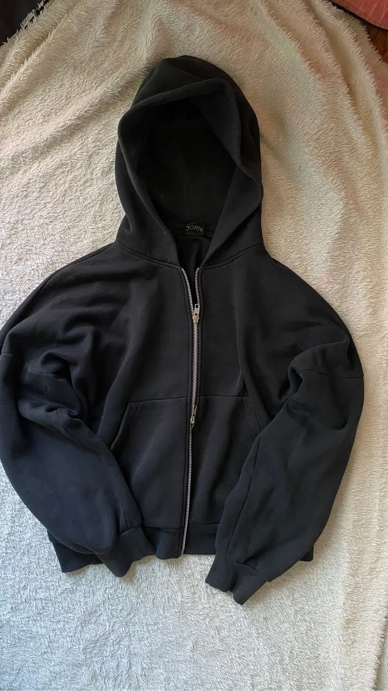black hoodie photo 1