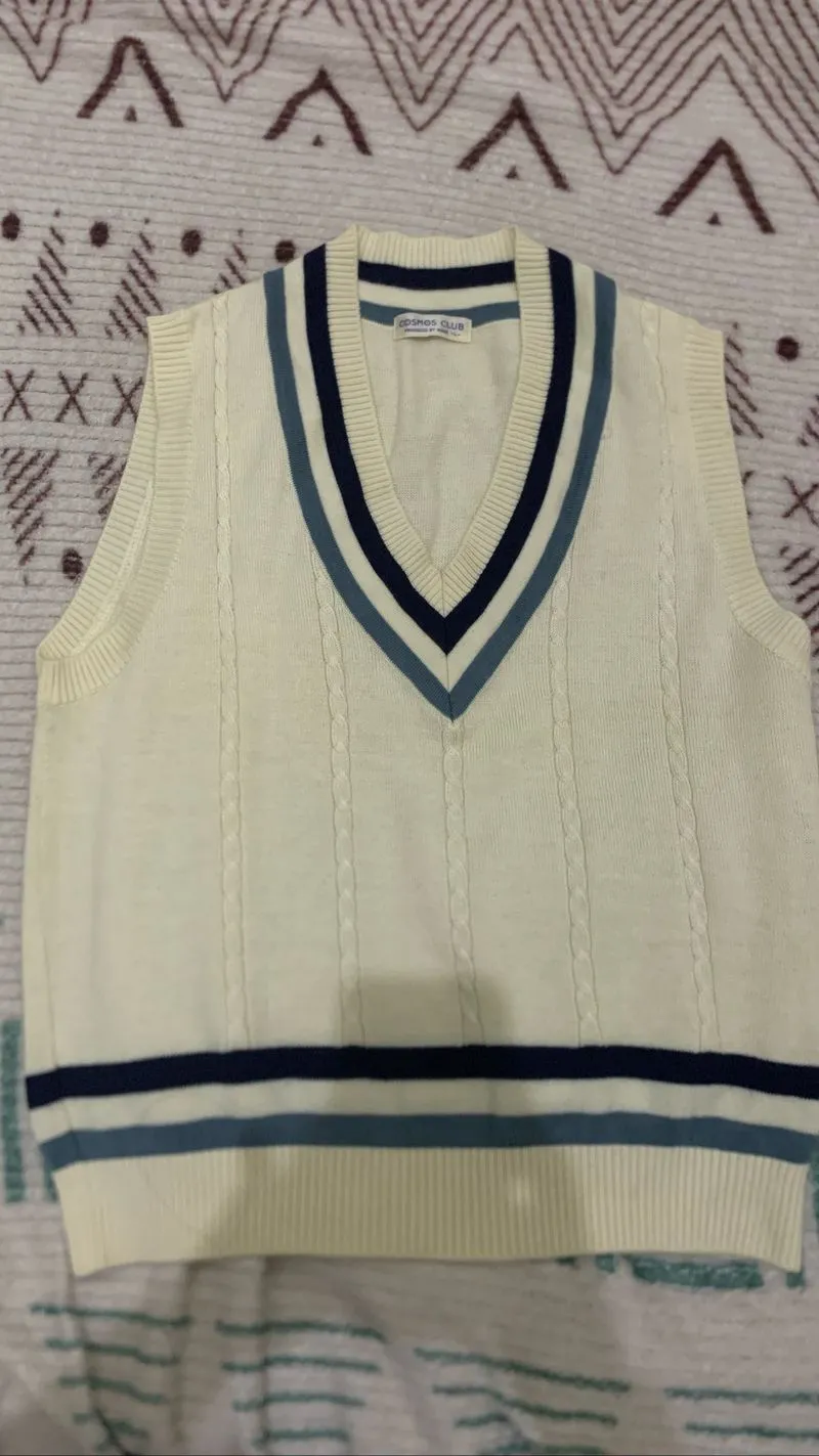 vest cosmos club photo 1