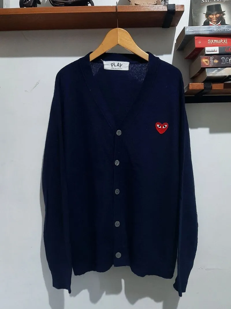 Play COMME DES GARCONS photo 1