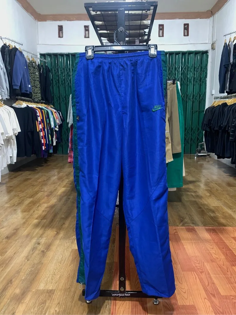 vintage 90s Nike track pants photo 1