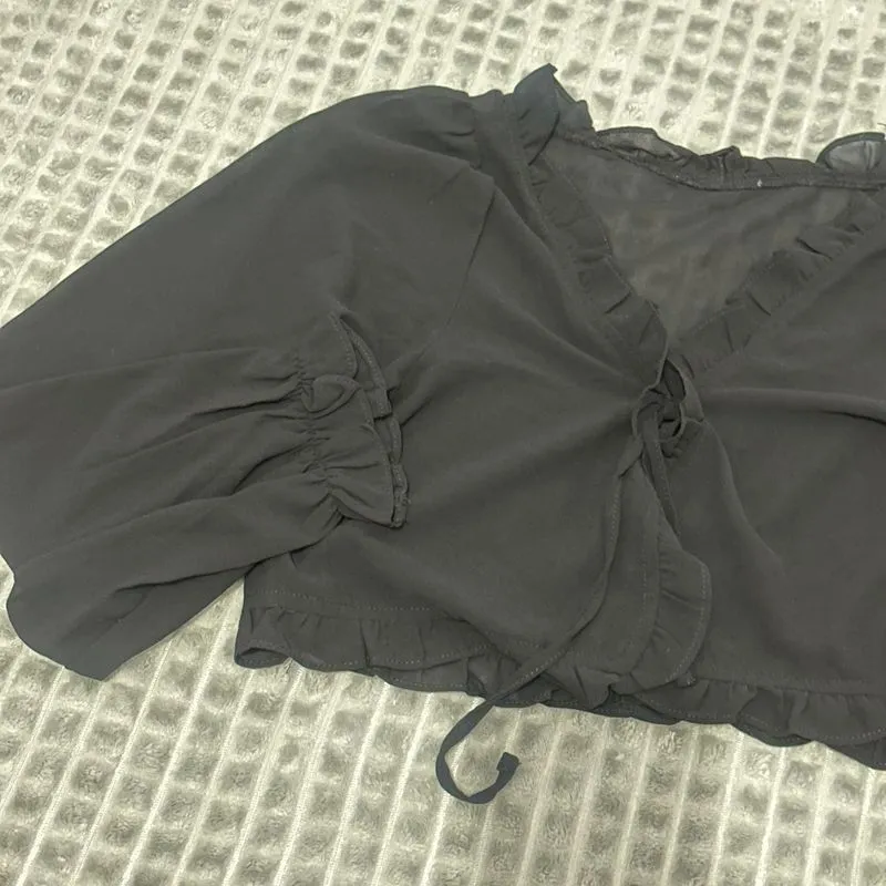 Outer croptop ruffle photo 1