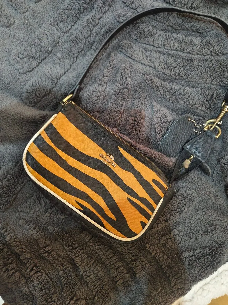coach tiger print photo 1
